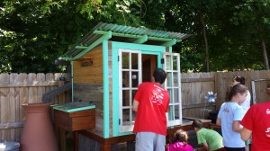 This Backyard Urban Chicken Coop was made from re-purposed building materials and boasts a spiral staircase for the hens.